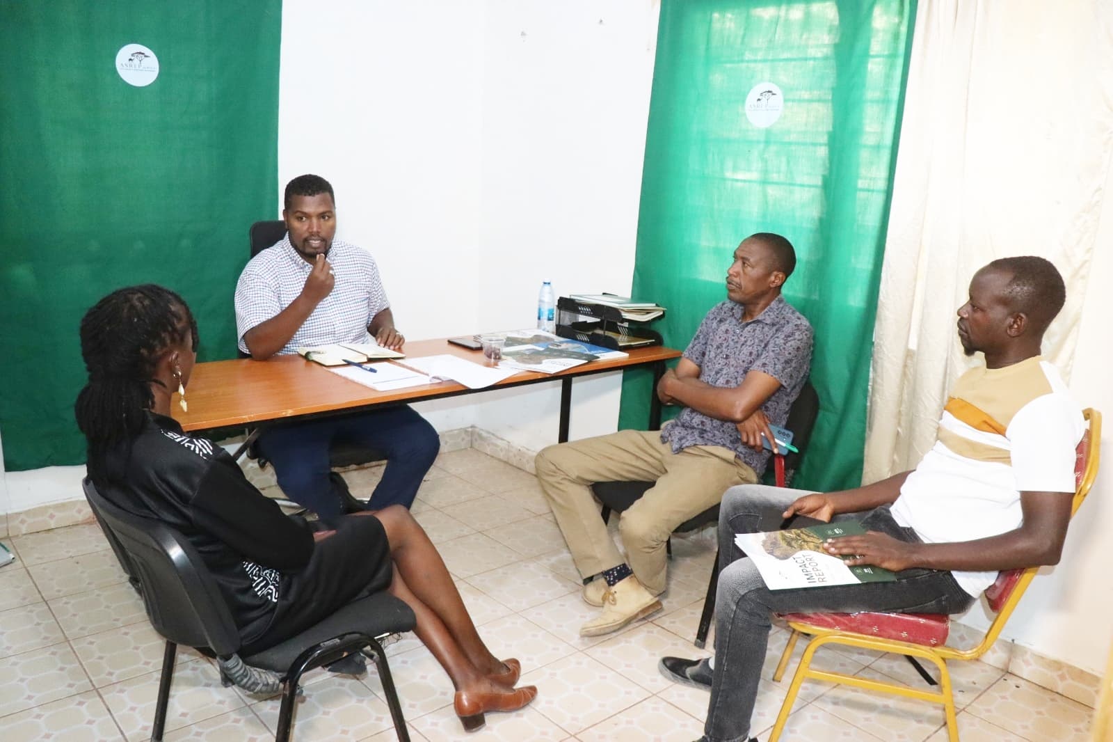 Four representatives from ASREP Africa and AGAR in roundtable discussion at the MOU Framework Agreement signing